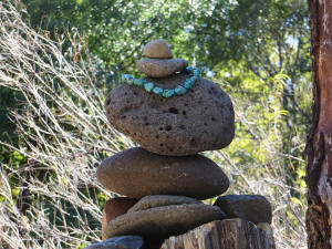 Stacked Rocks with A Terquoise Offering